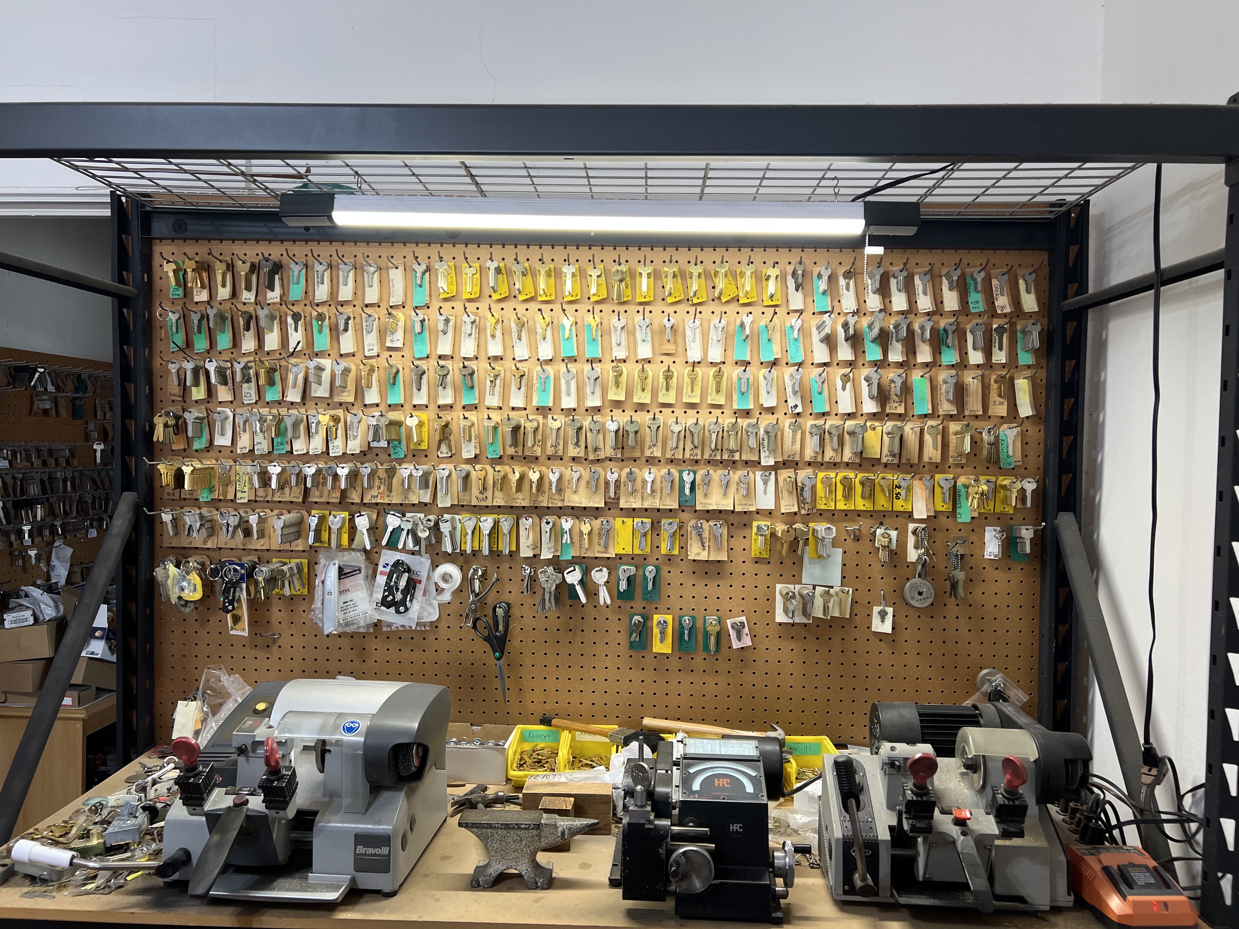 Key cutting machines and key wall at A-1 Locksmith Shop — commercial locksmith services in Brownwood TX